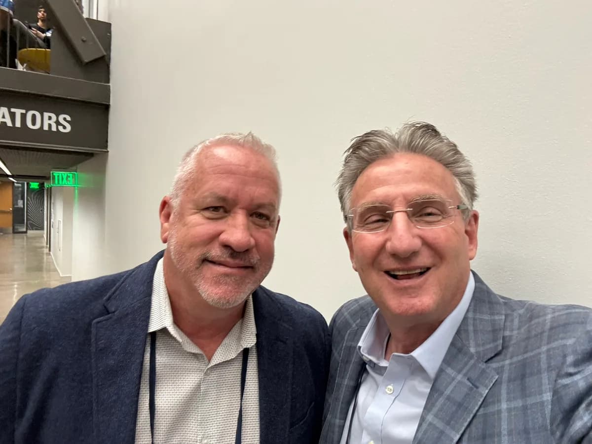 Mike Bass and Bill Mutch at the conference