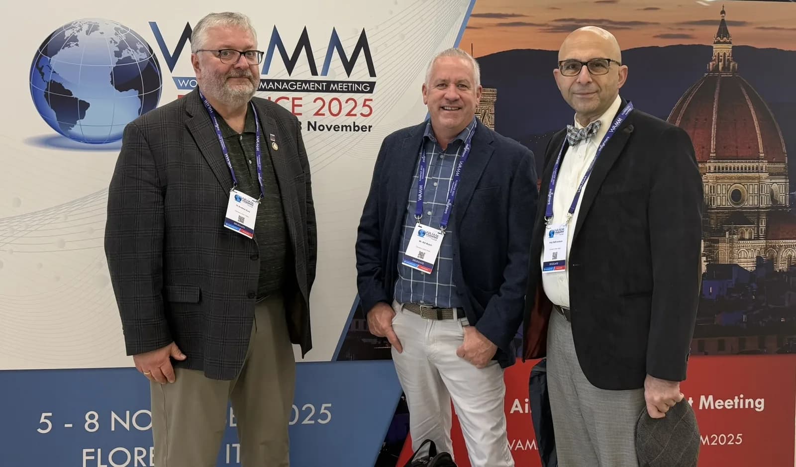 Dr. Andrew Zura, Bill Mutch and Dr. Rafi Avitsian in front of the WAMM Florence 2025 banner